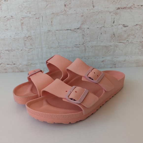 Birkenstock Shoes - Birkenstock Arizona EVA sandals in the color Coral Peach or Fondant Pink.